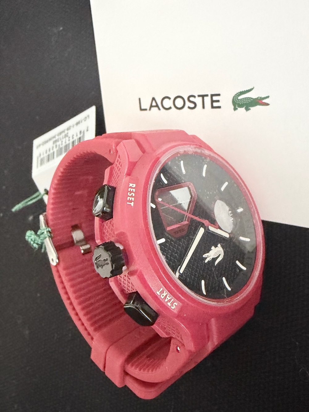 Brand new Lacoste Unisex Analog & Digital Watch in red with black dial.